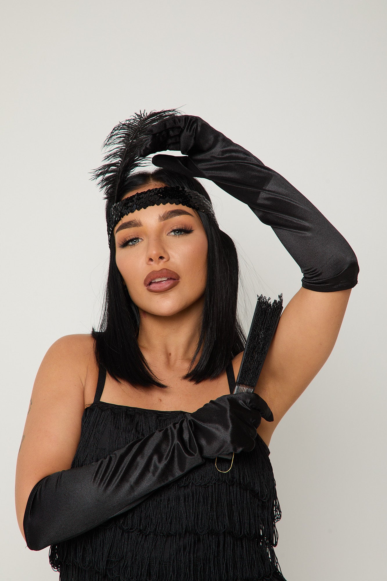 Sexy 1920s flapper costume with black sequin dress, gloves & feather headband – Dark Flapper by Been That Witch UK