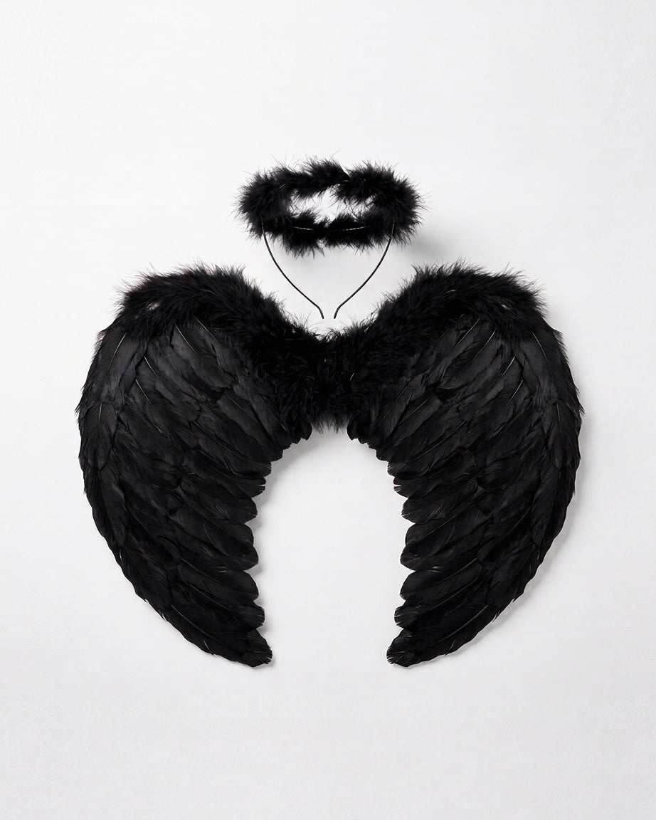 Black angel wings and halo headband costume accessory set, photographed flat against a light gray background.