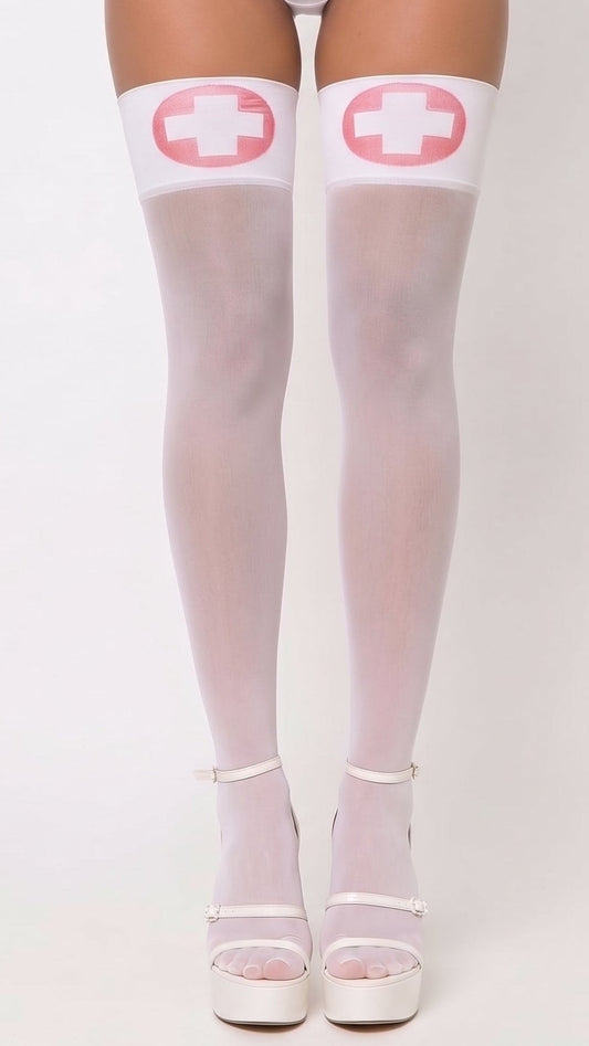 White thigh-high stockings with pink and white medical cross designs at the top, worn by a model with white platform sandals against a light gray background.