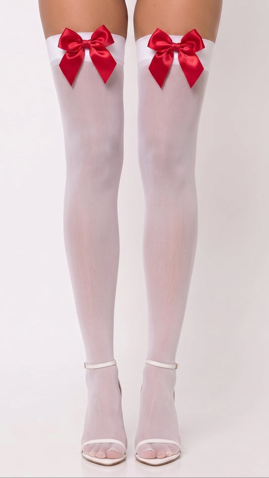 White thigh-high stockings with large red satin bows at the top, shown on a model's legs against a light gray studio background.